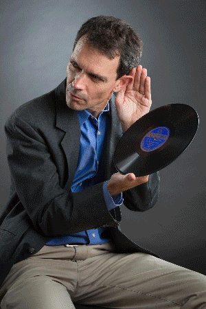 Marcos Sueiro Bal holding a vinyl record