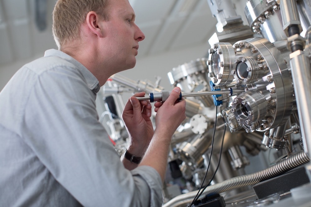 scientist with lab equipment